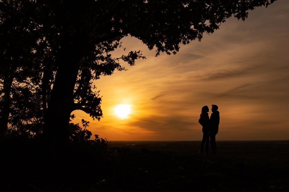 Engagement photos taken at Whittenham Clumps in Oxfordshire.