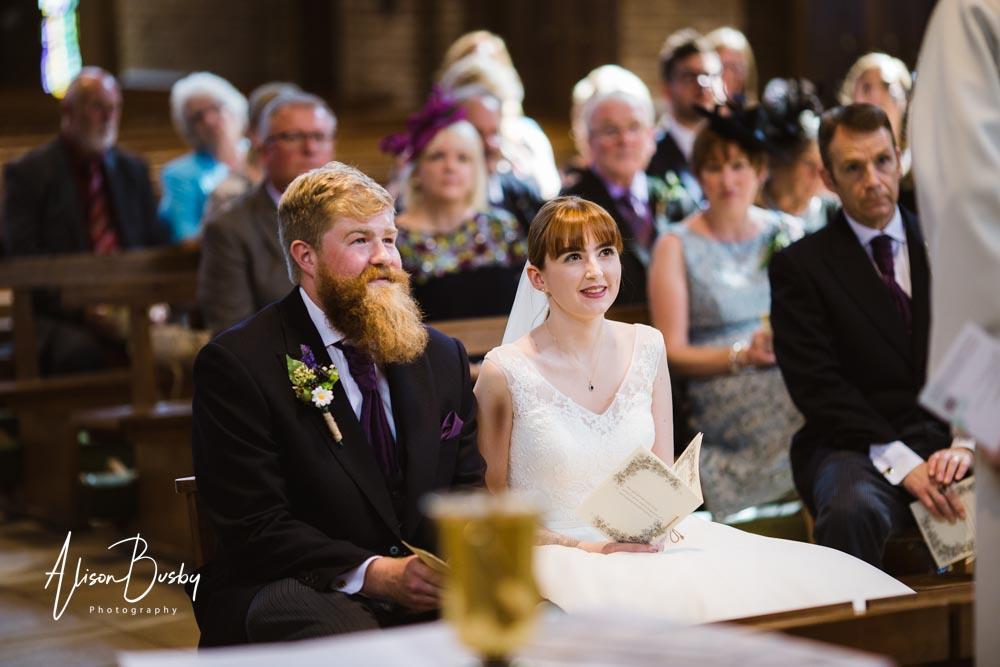 Bride and groom during wedding ceremony buckinghamshire