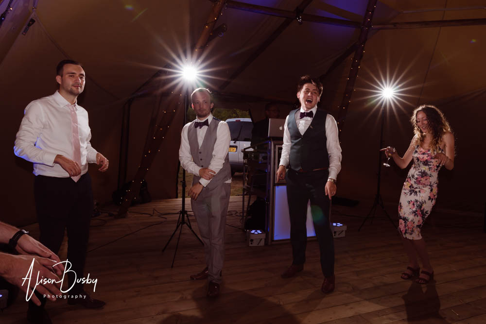 Guests dancing at Oxford tipi wedding. Dovecote Events.