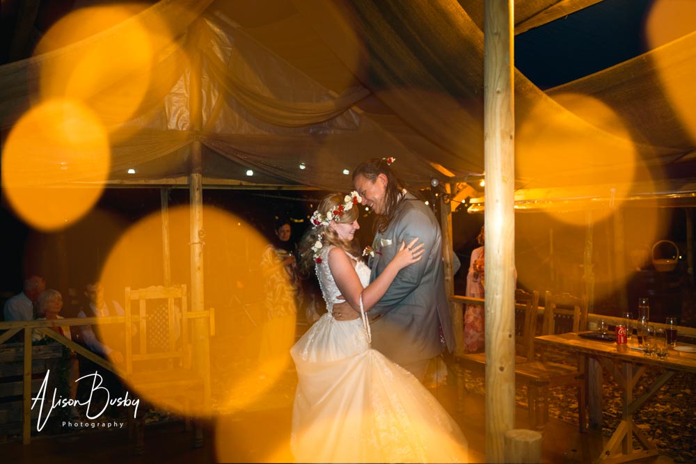 Buckinghamshire woodland wedding photographer. Bride and groom's first dance at Endeavour Woodland Weddings.