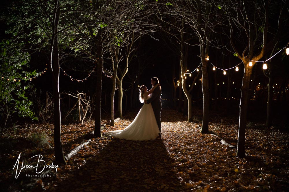 Buckinghamshire woodland wedding. Night portrait of bride and groom at Endeavour Woodland Weddings.