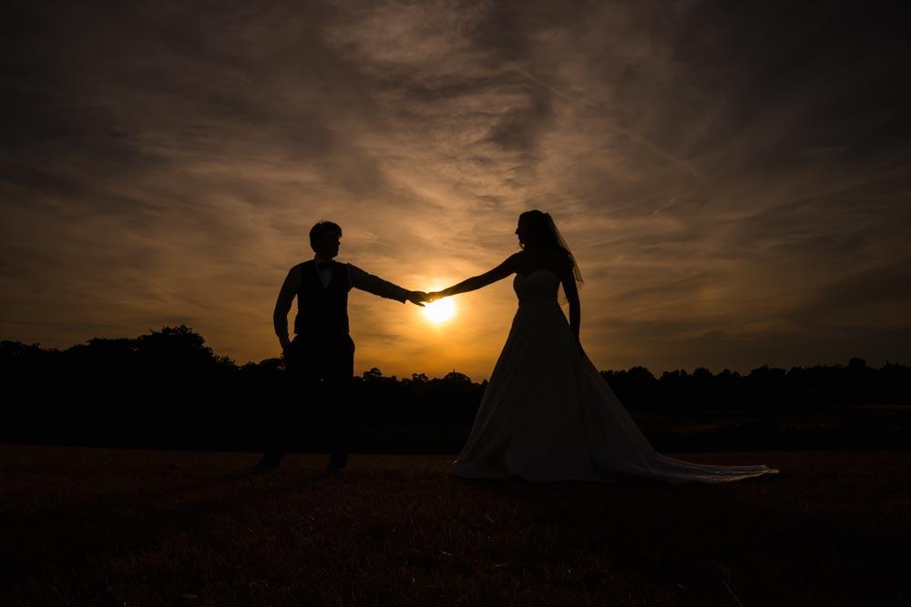 bride and groom sunset photo at Oxforshire wedding