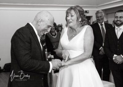Groom puts ring on wrong finger at Cosener's House wedding in Abingdon