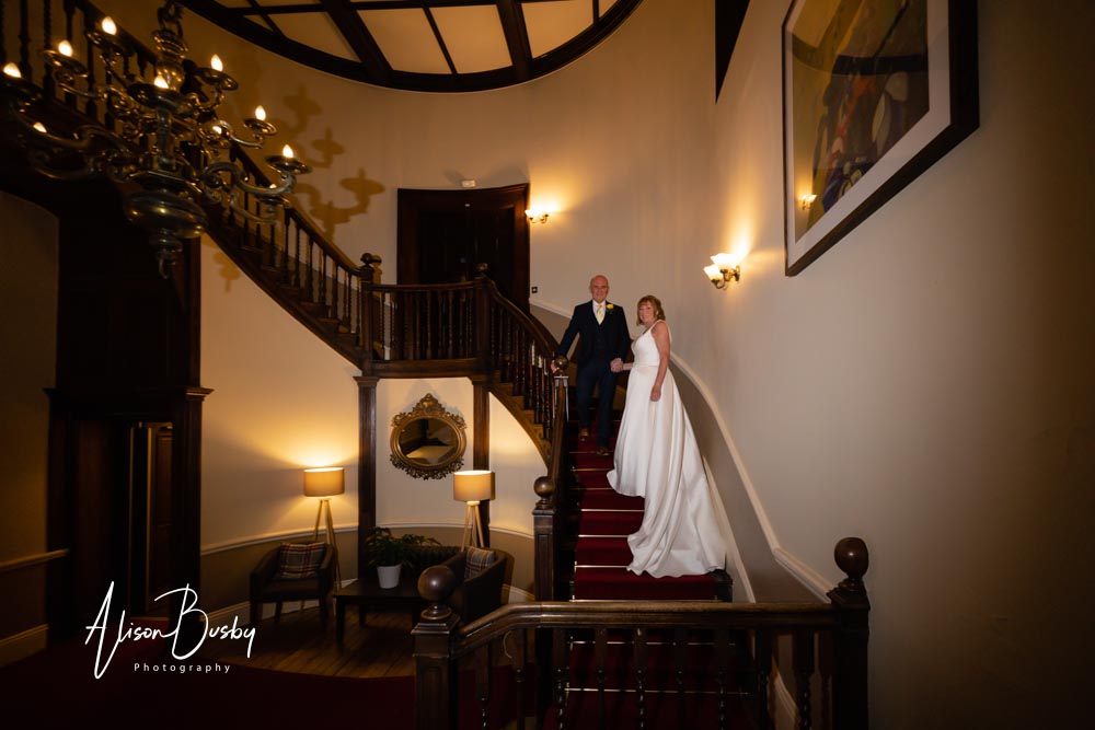 Night photo of bride and groom at the Cosener's House in Abingdon Oxfordshire.