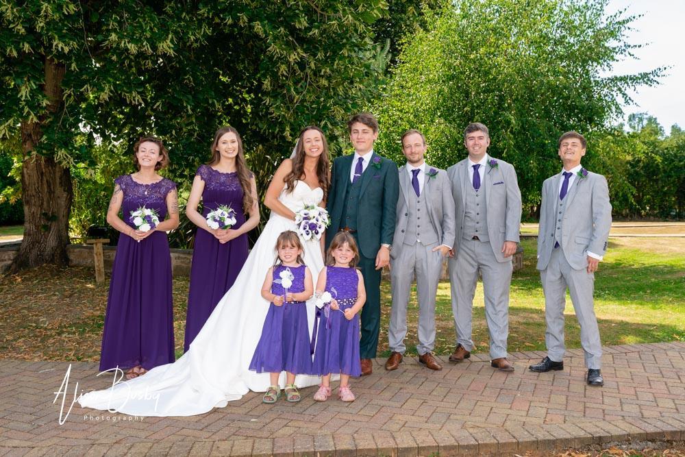 Group photo  by Dovecote Events Wedding Photographer