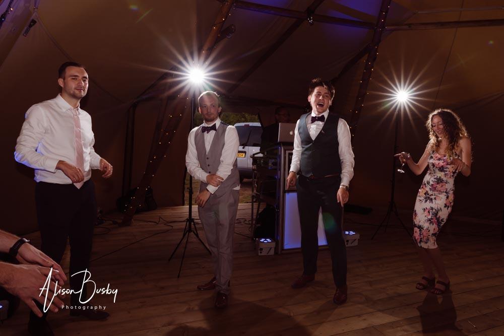 Dovecote Events wedding photographer. Guests dancing