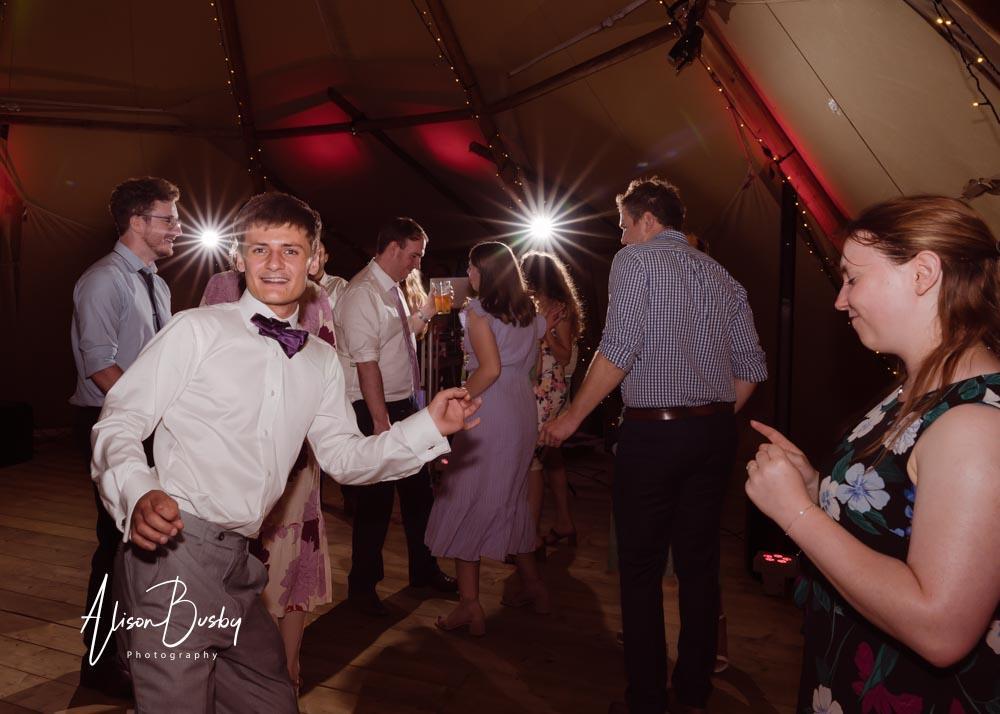 Dovecote Events wedding photographer. Guests dancing
