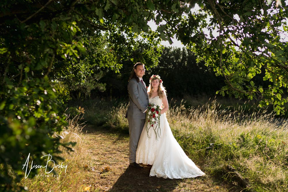 Bride and groom at sunset by Endeavour Woodland Weddings photographer
