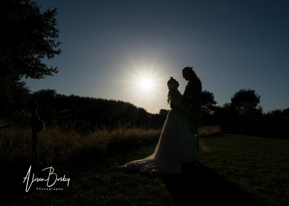 Bride and groom at sunset by Endeavour Woodland Weddings photographer