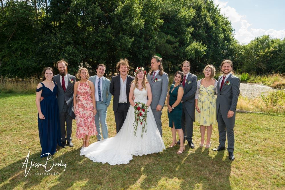 Group photo  by Dovecote Events Wedding Photographer