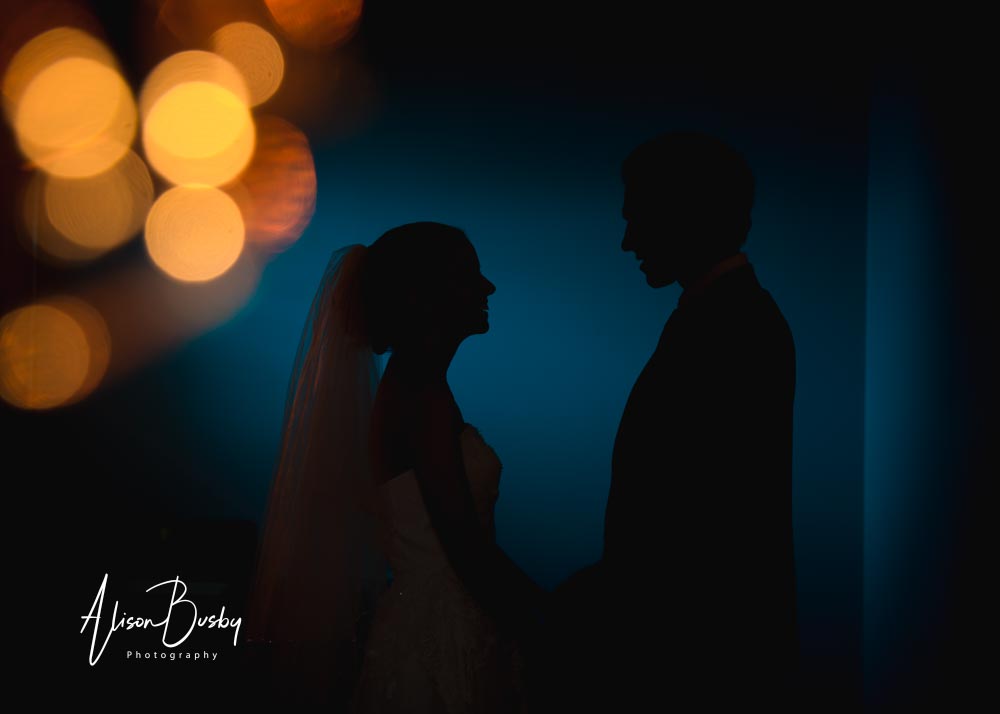 Couple silhouette at Eynsham Hall in Oxfordshire
