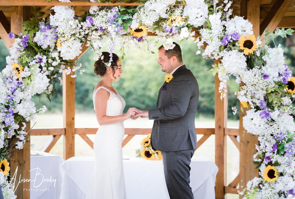 Grovefield House wedding photographer. Outdoor wedding ceremony.