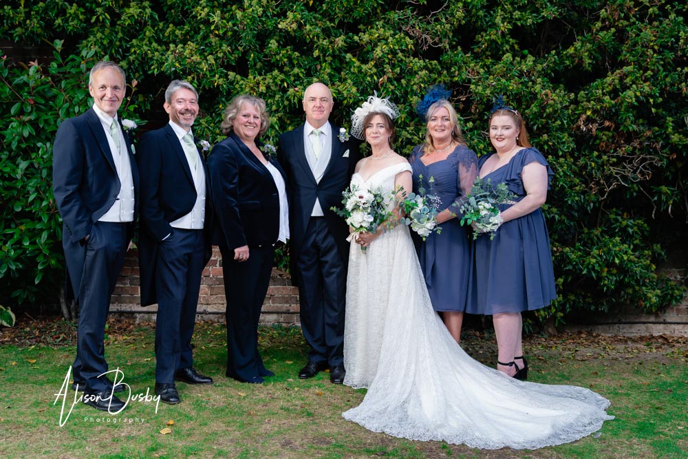 Group wedding photo at Kings Chapel in Amersham