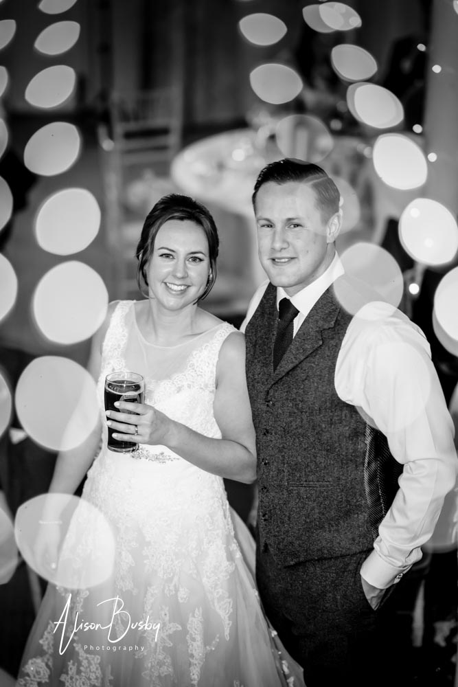 Kings Chapel Wedding. Bride and groom inside chapel at night in black and white