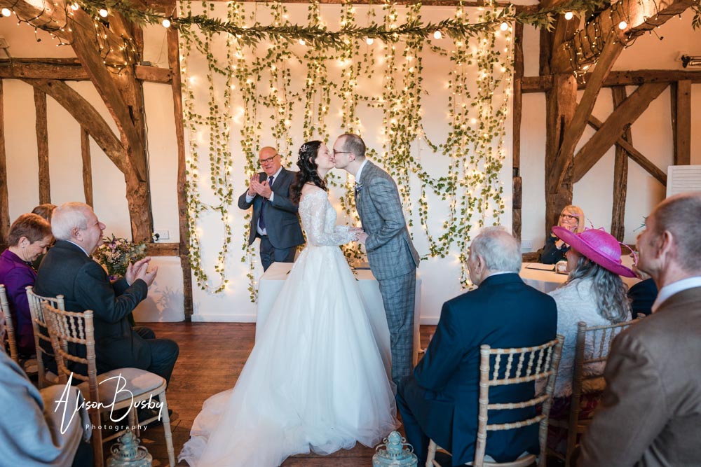 Wedding ceremony at Old Luxters Barn in Oxfordshire