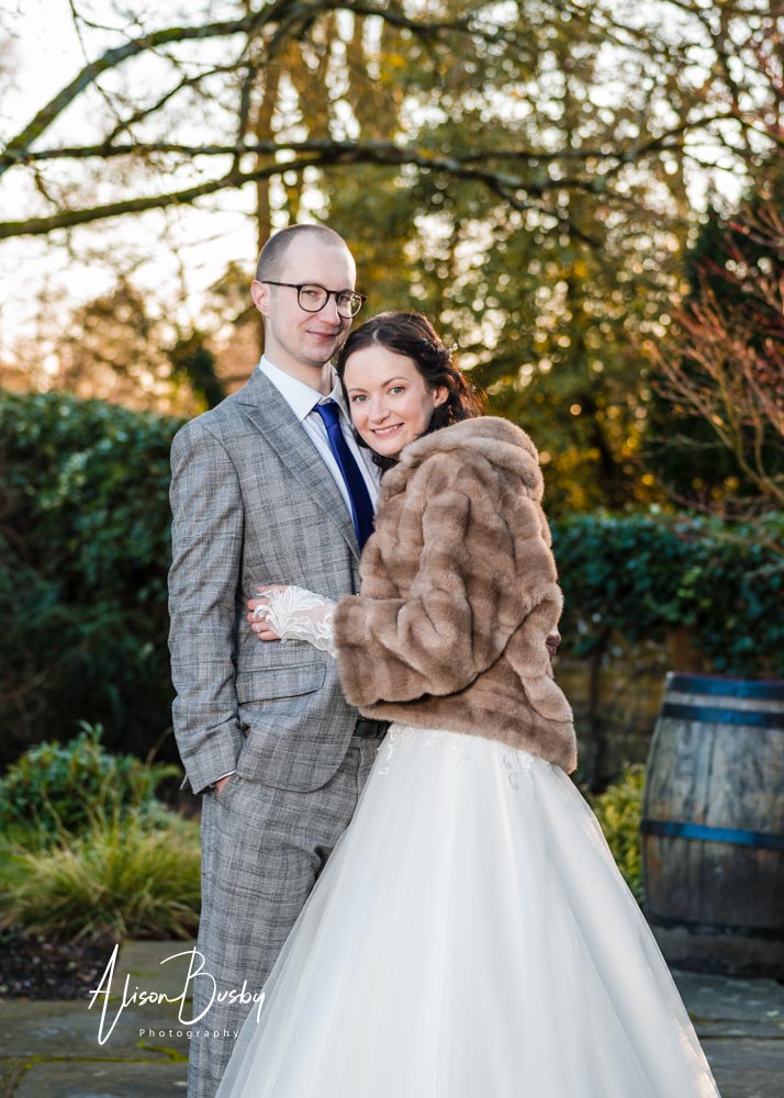 Bride and groom portrait by Luxters Barn wedding photographer
