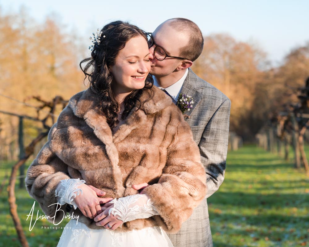 Bride and groom portrait by Luxters Barn wedding photographer