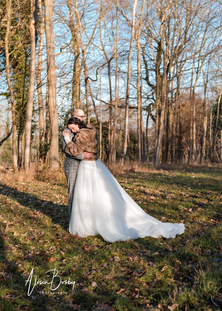 Bride and groom portrait by Luxters Barn wedding photographer