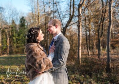 Bride and groom portrait by Luxters Barn wedding photographer