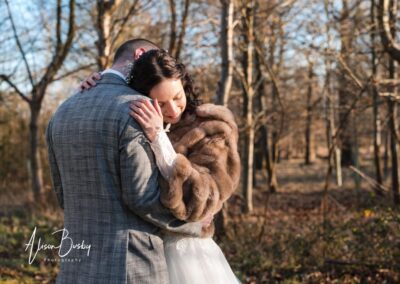 Bride and groom portrait by Luxters Barn wedding photographer