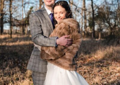 Bride and groom portrait by Luxters Barn wedding photographer