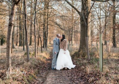 Bride and groom portrait by Luxters Barn wedding photographer