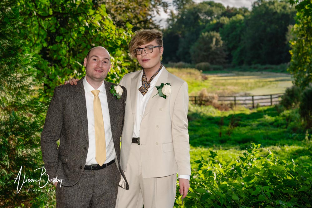 Missenden Abbey Wedding Photographer. Newly wed grooms in grounds of Missenden Abbey