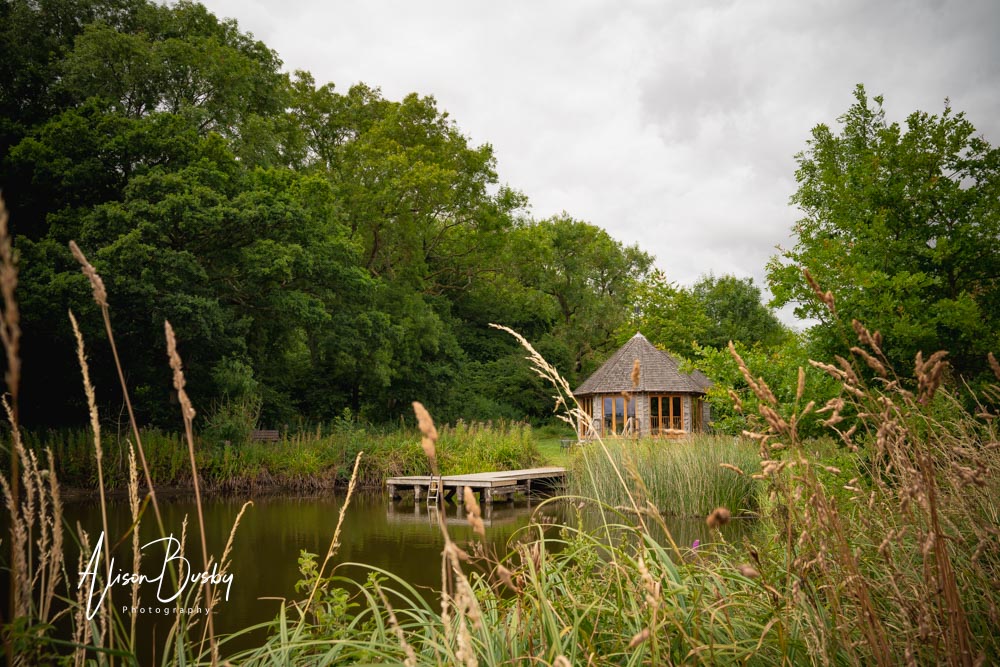 Sheepdrove Organic Farm. Boathouse and lake.