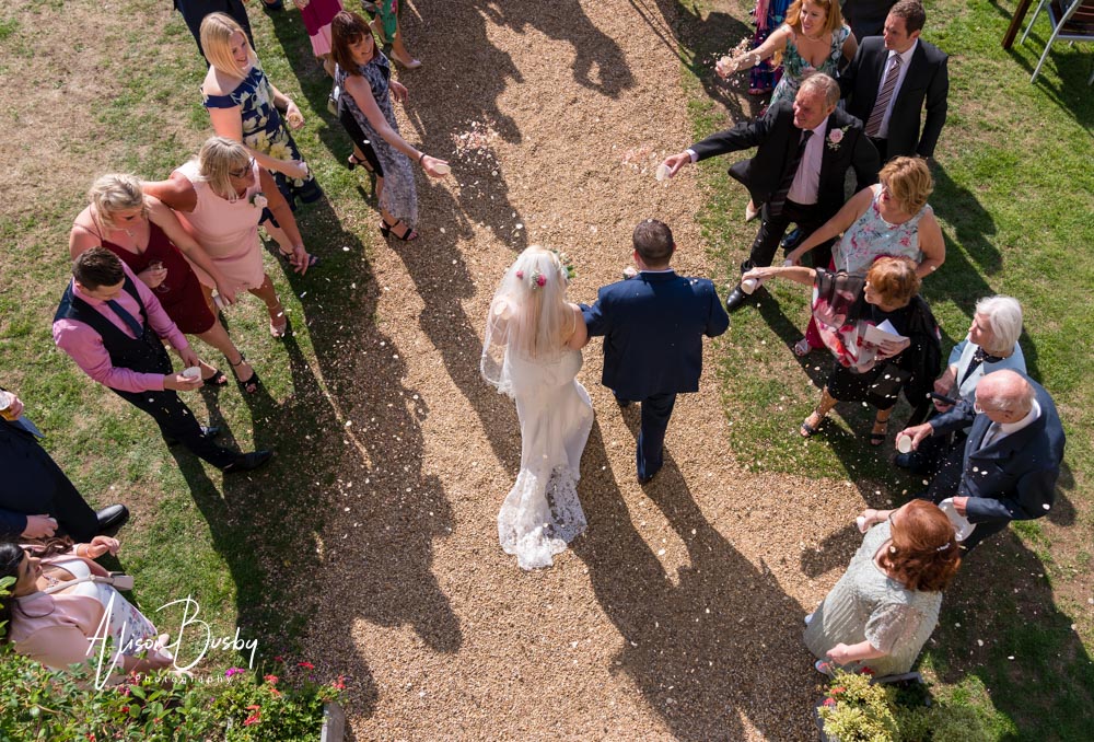 Confetti tunnel at Shendish Manor wedding