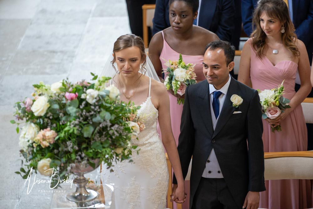 Bride and groom by St Cross College wedding photographer. Oxfordshrie wedding