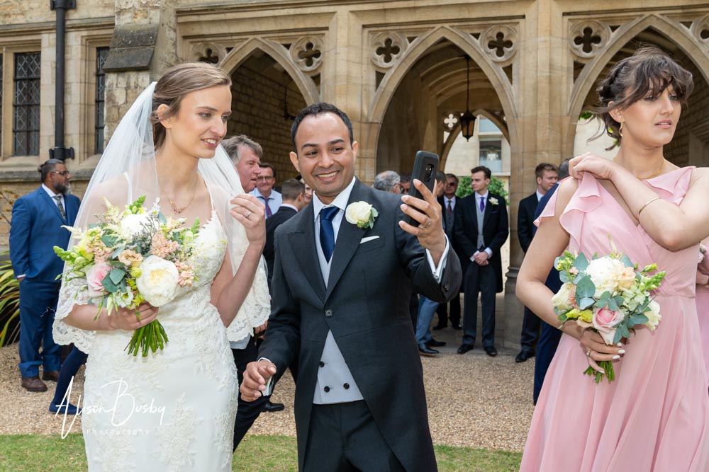Bride and groom by St Cross College wedding photographer. Oxfordshrie wedding