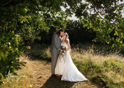 Buckinghamshire woodland wedding. Bride and groom at sunset at Endeavour woodland weddings.