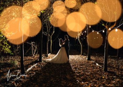 Buckinghamshire woodland wedding. Bride and groom at night at Endeavour woodland weddings.