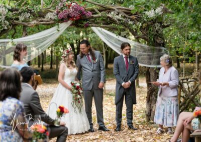 Buckinghamshire woodland weddings. Bride and groom during wedding ceremony at Endeavour woodland weddings.