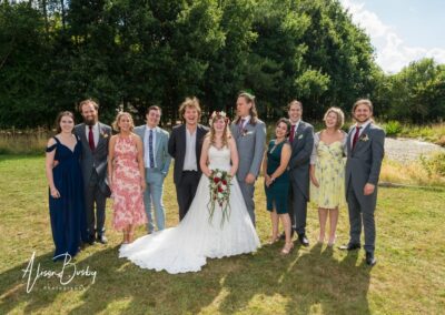 Buckinghamshire woodland weddings. Bride and groom with guests at Endeavour woodland weddings.
