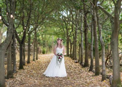 Buckinghamshire woodland weddings. Bride walks down aisle at Endeavour woodland weddings.