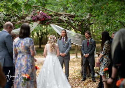 Buckinghamshire woodland weddings. Bride and groom during wedding ceremony at Endeavour woodland weddings.