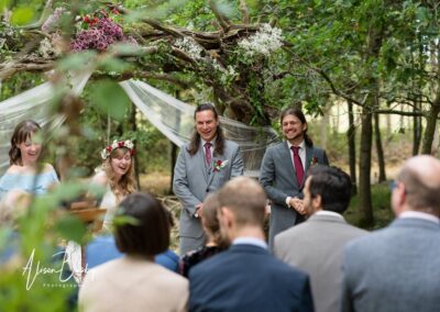Buckinghamshire woodland weddings. Bride and groom during wedding ceremony at Endeavour woodland weddings.