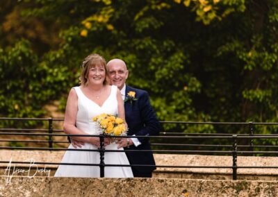 Cosener's House wedding photographer. Bride and groom on bridge
