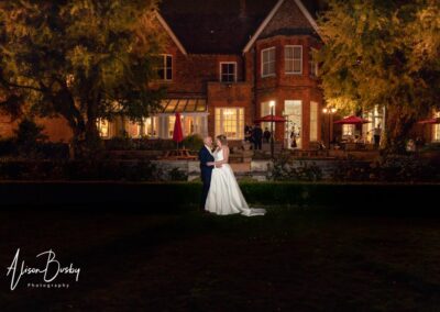 Cosener's House wedding photographer. Bride and groom outside Coseners House at night.
