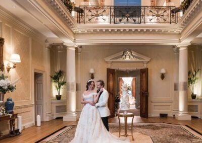 Hedsor House wedding photographer. Couple in Great Hall.