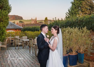 Kings Chapel Old Amersham. Winter wedding. Bride and groom in gardens of Kings Chapel.