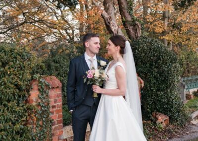 Kings Chapel Old Amersham. Winter wedding. Bride and groom behind Kings Chapel, Buckinghamshire