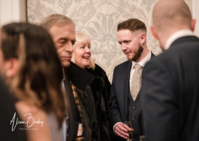 Kings Chapel Old Amersham. Winter wedding guests.