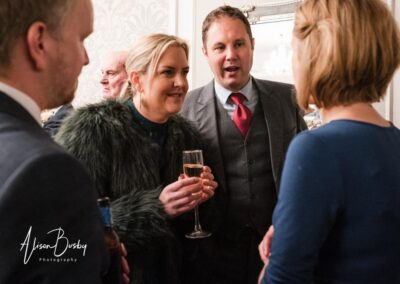Kings Chapel Old Amersham. Winter wedding guests.