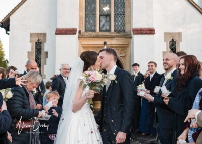 Bride and groom outside church in Chesham