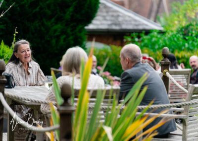 Kings Chapel wedding in September. guests relaxing in garden