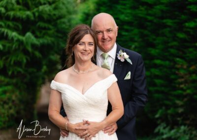 Kings Chapel wedding in September. Bride and groom in lane behind chapel.