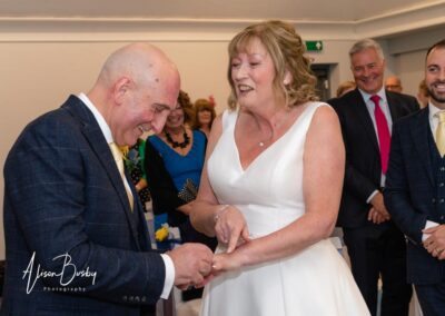Older Couple wedding photos. Bride and groom during wedding ceremony.