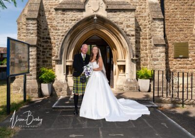 Bride and father of the bride at Our Lady and St Edmunds Church in Abingdon, Oxfordshire.